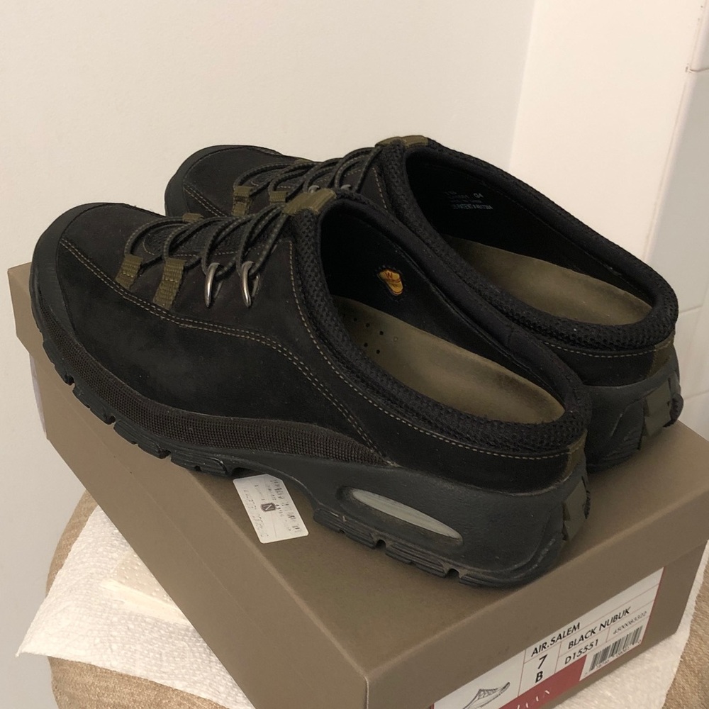 ColeHaan waterproof clog style shoes with Nike Air technology in black.